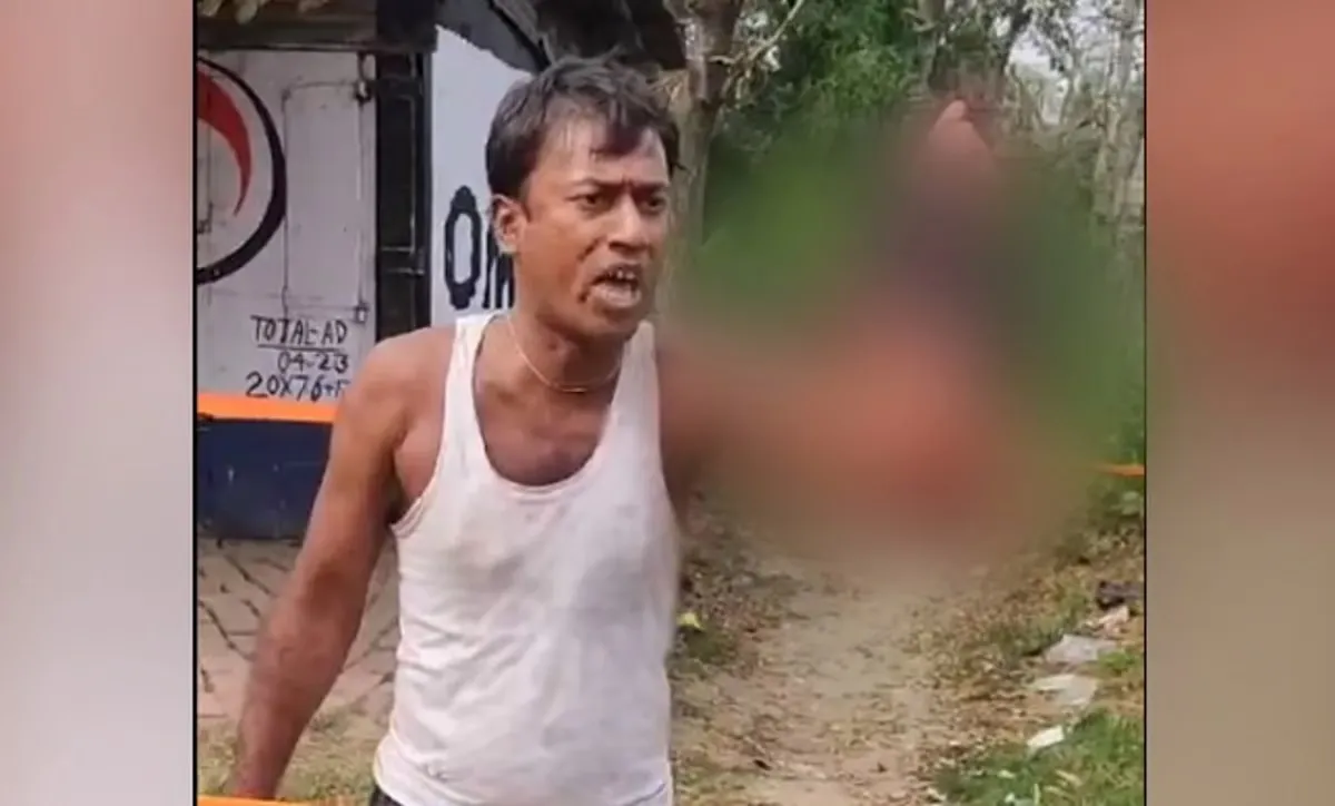 his wife's severed head in one hand and a sickle in the other.