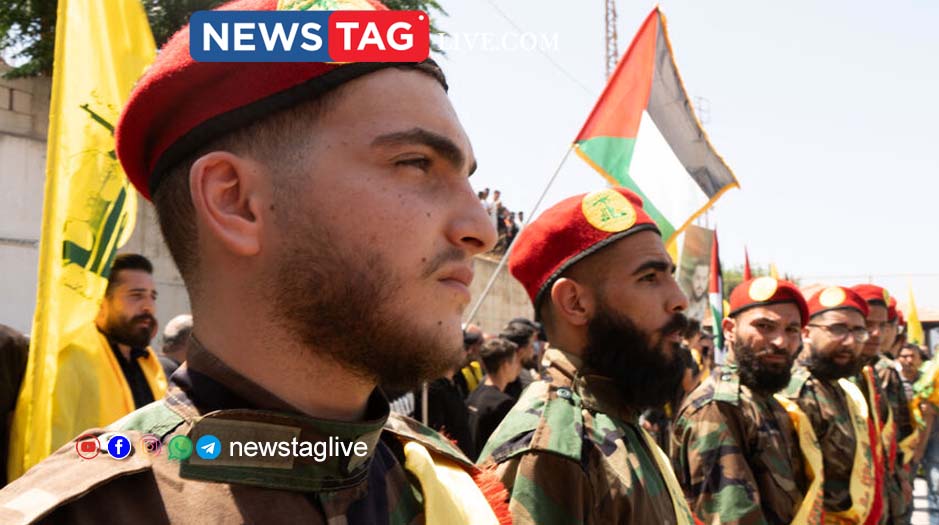 Commrades attend the funeral of killed Hezbollah fighter Wehbi Mohammed Ibrahim, in the village of Kfar Kila in southern Lebanon