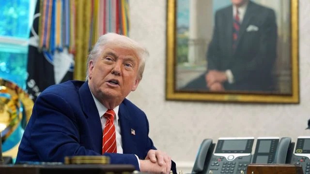 Trump signs ban on travel to US by nationals from 12 countries, including Afghanistan, Haiti and Iran