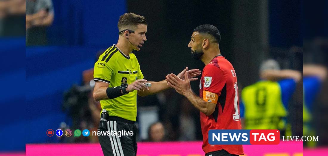 Egypt's Mohamed Salah in conversation with referee Francois Letexier