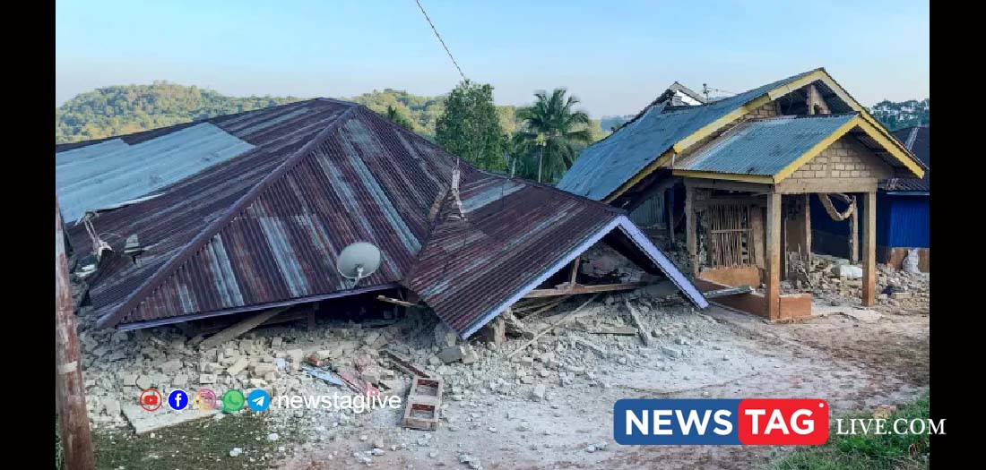 Damaged houses are seen following a 7.7-magnitude earthquake in Indonesia